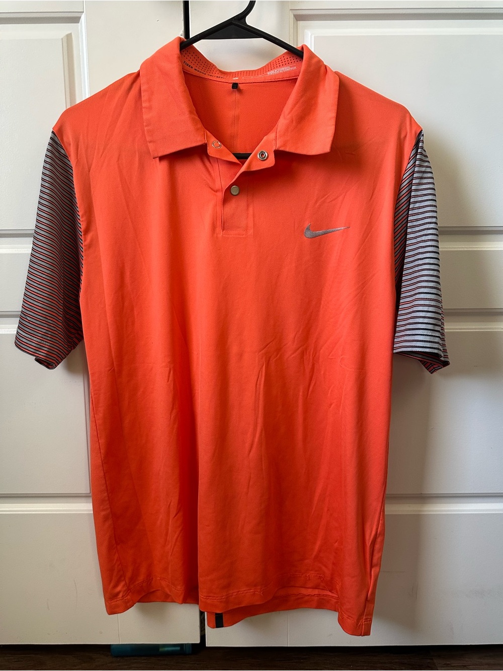 Nike Men's Orange Golf Polo with Striped Sleeves